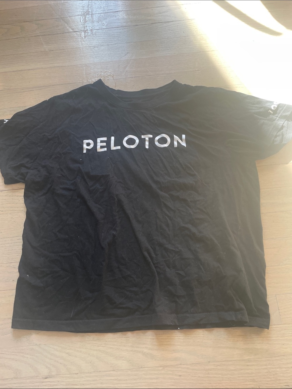 Peloton Black Tee with White Logo Center Chest